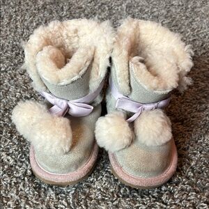 UGG Cozy Fur-Lined Boots with Pom Poms